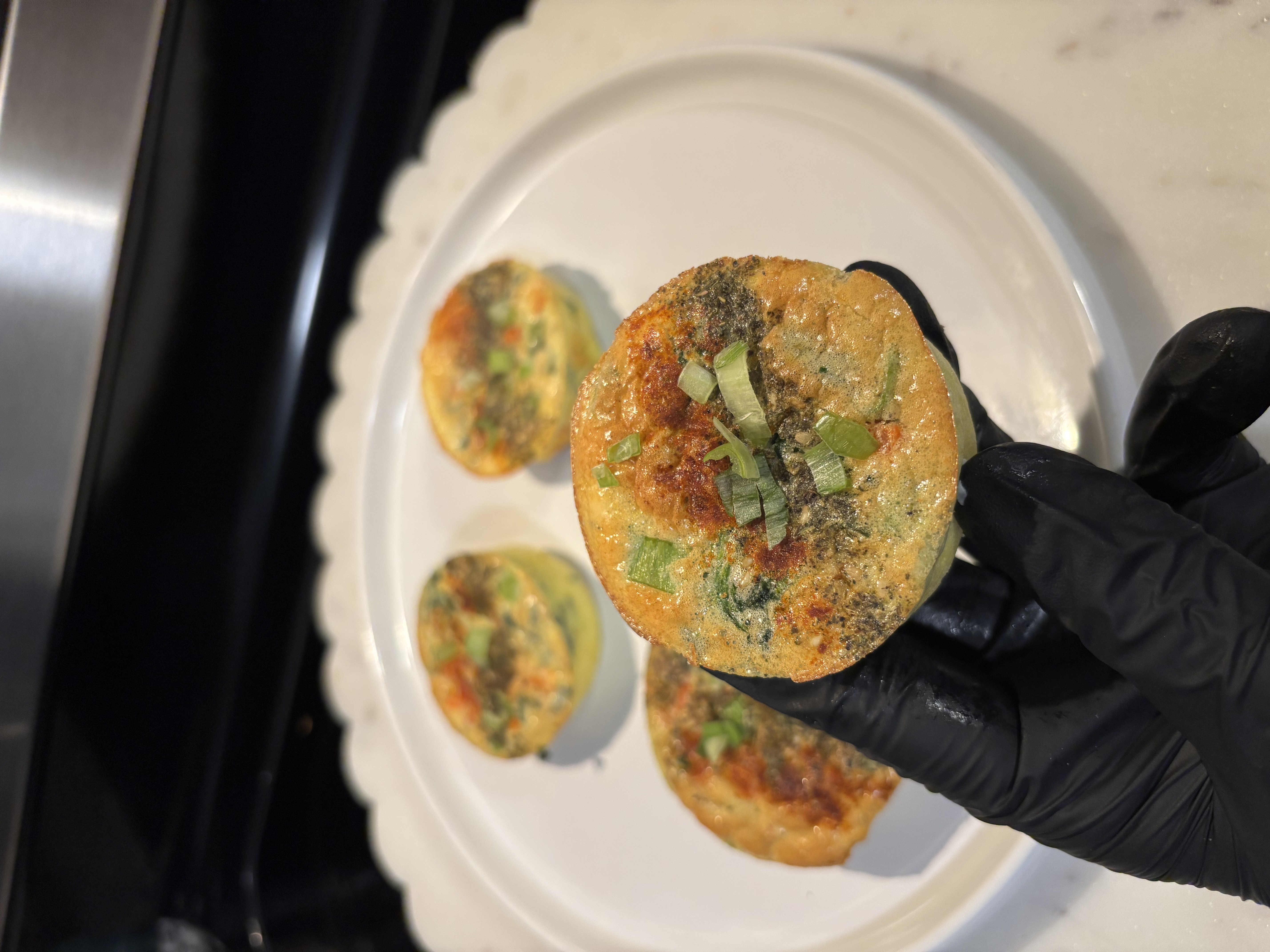 Za'atar egg bites with cottage cheese, gruyere, spinach and red bell pepper